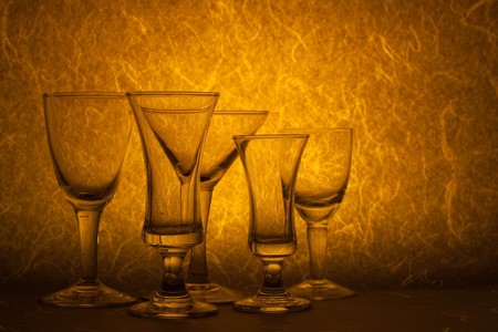 glass on brown backgroundの写真素材