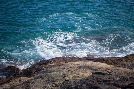 Characteristics of the wave Crashing into rocks