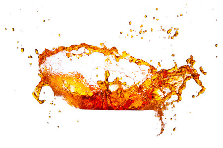 brown water splash on a white background の写真素材