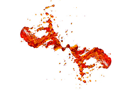 brown water splash on a white background の写真素材