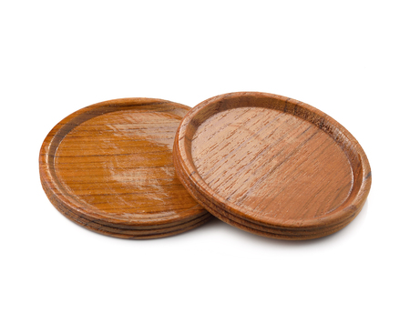 Wooden glass coasters  on isolated background.の写真素材