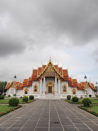The Marble Temple  Wat Benjamabophit  was under the cloudy sky, Bangkok Thailandの写真素材