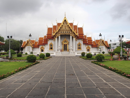 The Marble Temple  Wat Benjamabophit  was under the cloudy sky, Bangkok Thailandの写真素材