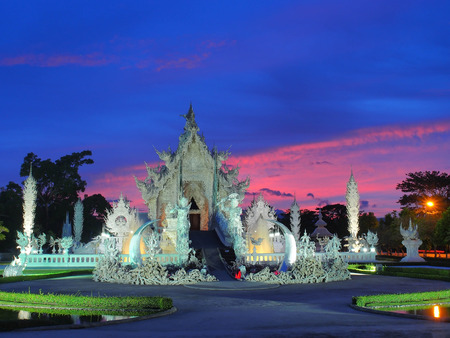 The White Temple (Wat Rong Khun) was under amazed sunset sky, Chiangrai, Thailandの写真素材