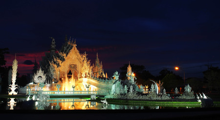 The White Temple (Wat Rong Khun) was under amazed sunset sky, Chiangrai, Thailandの写真素材