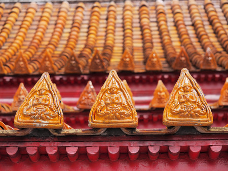 Pray angles art design, called Thep Panom, the unique Thai art, at roof of the Marble Temple, Bangkok, Thailandの写真素材