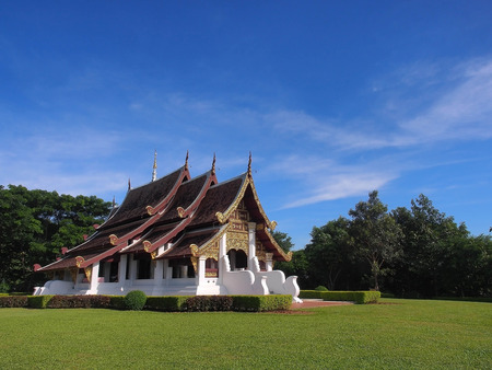 Northern-styled Thai art in public church under blue sky, Chiangrai, Thailandの写真素材