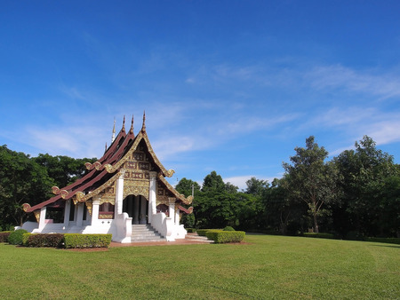 Northern-styled Thai art in public church under blue sky, Chiangrai, Thailandの写真素材