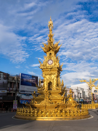 CHIANGRAI, THAILAND - SEPTEMBER 14, 2014: The Golden Thai art clock tower in downtown of Chiangrai province is the most beautiful clock tower in Thailand. It is designed by the most famous artist, Mr.Chaleamchai Kositpipat.のeditorial素材