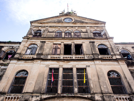 Old colonial art building in Bangkok under cloudy sky. Now this building is publick place, Fire station.のeditorial素材