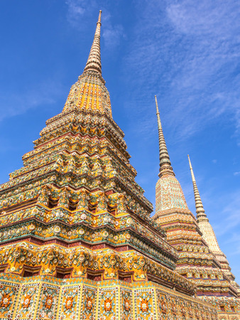 Great four Jedi in Wat Pho (Temple of Reclining Buddha) under blue sky, Bangkok, Thailandの写真素材