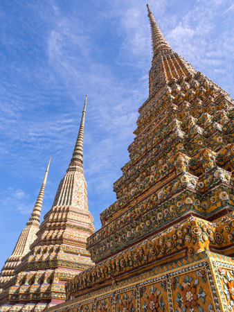 Great four Jedi in Wat Pho (Temple of Reclining Buddha) under blue sky, Bangkok, Thailandの写真素材