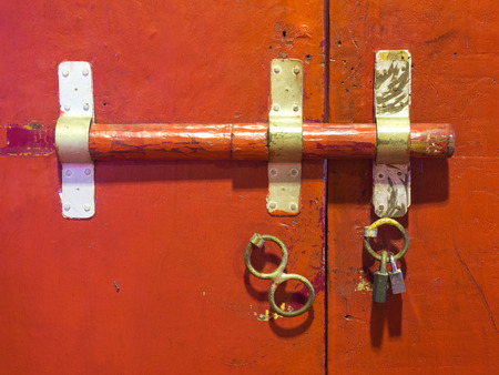 Old style door locking inside Thai templeの写真素材