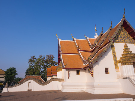 main church of Wat Ming Muang in Nan, outstanding with Northern style Thai artの写真素材