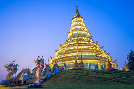 Chinese style nine level pagoda in Thai temple under twilight sky twilight skyの写真素材