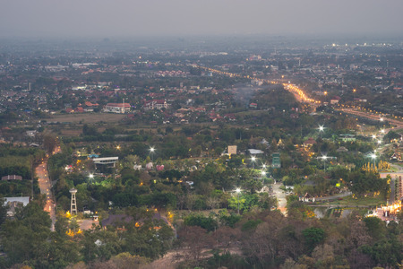 Mountain top view of Chiangmai city in twilight period, Thailandの写真素材