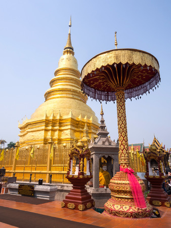 Wat Phra That Hari Phun Chai in Lamphun is outstanding Northern Thai art in Thailandの写真素材