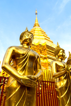 The Grand Golden Pagoda in Wat Phra That Doi Suthep is the most attractive landmark of Chiangmai in Thailand, during twilight periodの写真素材