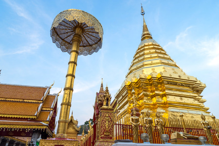 The Grand Golden Pagoda in Wat Phra That Doi Suthep is the most attractive landmark of Chiangmai in Thailand, during twilight periodの写真素材