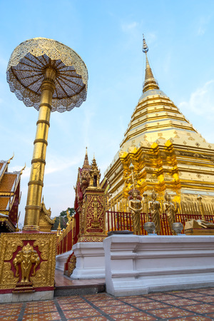 The Grand Golden Pagoda in Wat Phra That Doi Suthep is the most attractive landmark of Chiangmai in Thailand, during twilight periodの写真素材