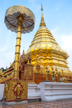 The Grand Golden Pagoda in Wat Phra That Doi Suthep is the most attractive landmark of Chiangmai in Thailand, during twilight periodの写真素材