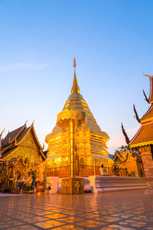 The Grand Golden Pagoda in Wat Phra That Doi Suthep is the most attractive landmark of Chiangmai in Thailand, during twilight periodの写真素材