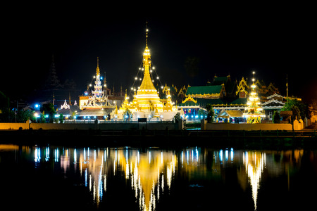 Wat Jong Klang is landmark of Maehongson, delicate unique fusion Burmese and Thai art in Thailand, on black backgroundの写真素材