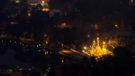 Wat Jong Klang is landmark of Maehongson, view from bird eye view, during dark night period, presented in panoramic ratioの写真素材