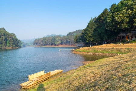 Pang Oung is pretty and serene lake in a valley glittering with sunlight in morning sunrise surrounded by mountainsの写真素材