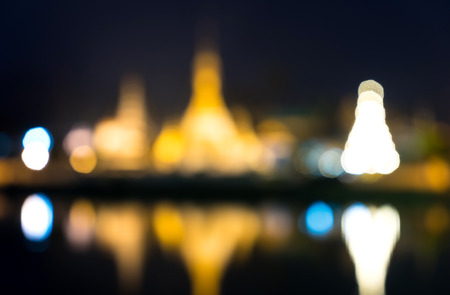 Out of focus blurring of Wat Jong Klang pagoda reflection on lake belowの写真素材