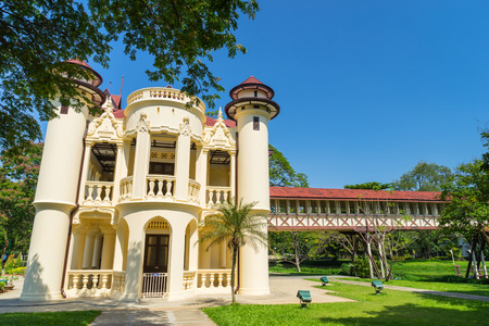 Left wing of Sanamchan palace with surrounding tree under blue skyのeditorial素材
