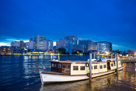 BANGKOK  MAY 17: Siriraj hospital with boat along Chaophraya river in Bangkok Thailand under twilight evening sky on May 17 2015.のeditorial素材