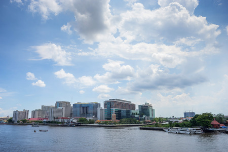 Buildings of Siriraj hospital the first hospital in Thailand along Chaophraya river under cloudy skyのeditorial素材