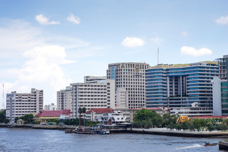 Buildings of Siriraj hospital the first hospital in Thailand along Chaophraya river under cloudy skyのeditorial素材