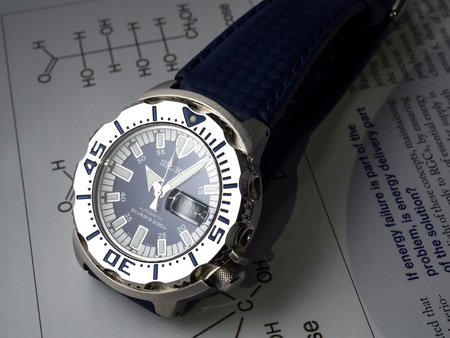 BANGKOK - SEPTEMBER 2: Seiko diver automatic watch, Royal blue monster limited model for only Thailand, place on paper under low key lighting, was taken on September 2, 2015, in Bangkok, Thailand.のeditorial素材
