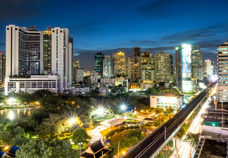 BANGKOK - AUGUST 8: Bangkok skyscraper buildings under twilight evening sky with night light view, was taken on August 8, 2015, in Bangkok, Thailandのeditorial素材