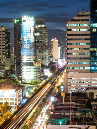 BANGKOK - AUGUST 8: Bangkok skyscraper buildings under twilight evening sky with night light view, was taken on August 8, 2015, in Bangkok, Thailandのeditorial素材