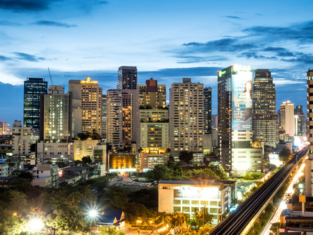 BANGKOK - AUGUST 8: Bangkok skyscraper buildings under twilight evening sky with night light view, was taken on August 8, 2015, in Bangkok, Thailandのeditorial素材