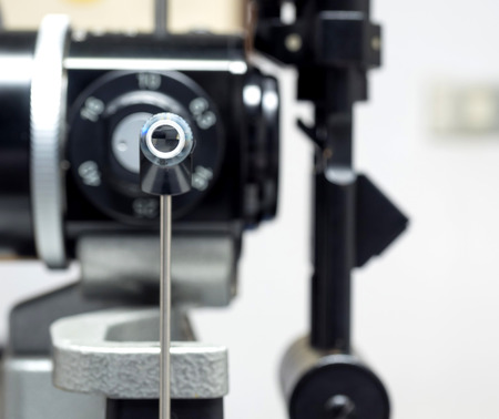 Goldmann applanation tonometry is gold standard equipment for measure eye pressure, used by ophthalmologist in hospitalの写真素材