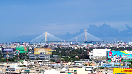 BANGKOK - JUNE 16: Large Bhumibhol bridges cross Chaophraya river under cloudy non-clearing sky in Bangkok, Thailand, was taken on June 16, 2015.のeditorial素材