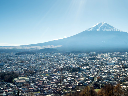 Fuji mountain with cityscape view under blue sky in Japanの写真素材