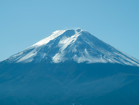 Snow top of Fuji mountain in Japan with low contrast light effectの写真素材