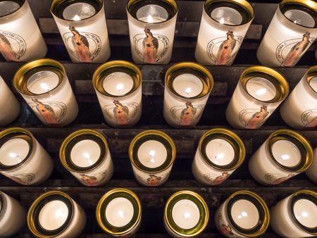 Group of beautiful candle and light of candles in Notre dame cathedral in Paris, Franceの写真素材