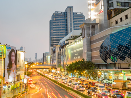 BANGKOK - FEBRUARY 8: MBK shopping with traffic crossroads in twilight evening time under clear sky in Bangkok, Thailand, was taken on February 8, 2016.のeditorial素材