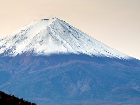 Close up view of top of Fuji mountain with cloudy poor skyの写真素材