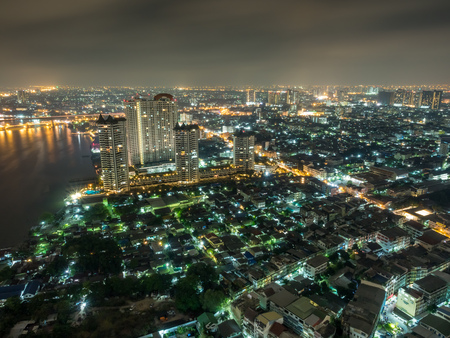 Cityscape night light view of Bangkok from skyscraper building view, Thailandの写真素材