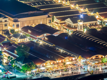 BANGKOK - MARCH 9: Skyscaper building view of Asiatique, large famous community mall along Chaophraya river, shown night light view with dark sky and river, in Bangkok, Thailand, was taken on March 9, 2016.のeditorial素材