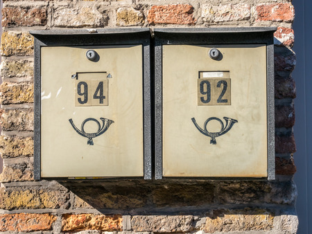 Brugge city scenes in Belgium, residential buildings, church, attractive and beautiful scenes, under blue skyの写真素材
