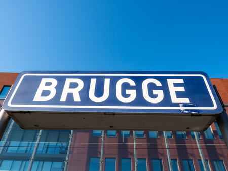 Brugge train station under clear blue sky in Belgiumのeditorial素材