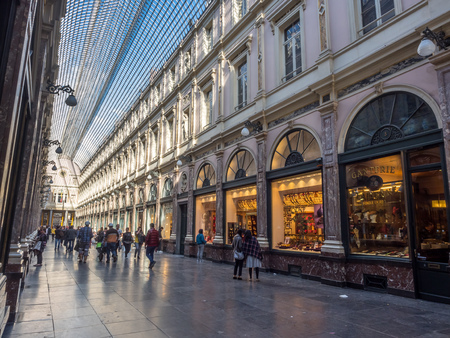 BRUSSELS - SEPTEMBER 29: Galleris Royales Saint Hubert Street is almost the first shopping street in Europe, located in Brussels, Belgium, taken on September 29, 2015.のeditorial素材